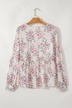 Floated pink blouse with floral print and u collar, loose cut