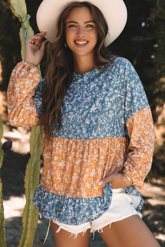 Orange blouse with flowers and color blocks *