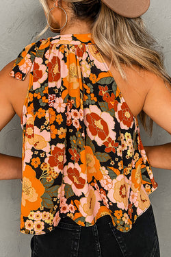 Licu de alto colorado sin mangas empatado con estampado floral naranja