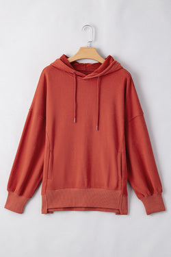 Ample hooded sweatshirt with tightening cord and drooping shoulder pockets Red Clay