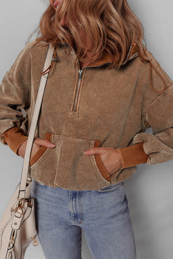 Brown corduroy hoodie with half zip and kangaroo pocket with drawstring