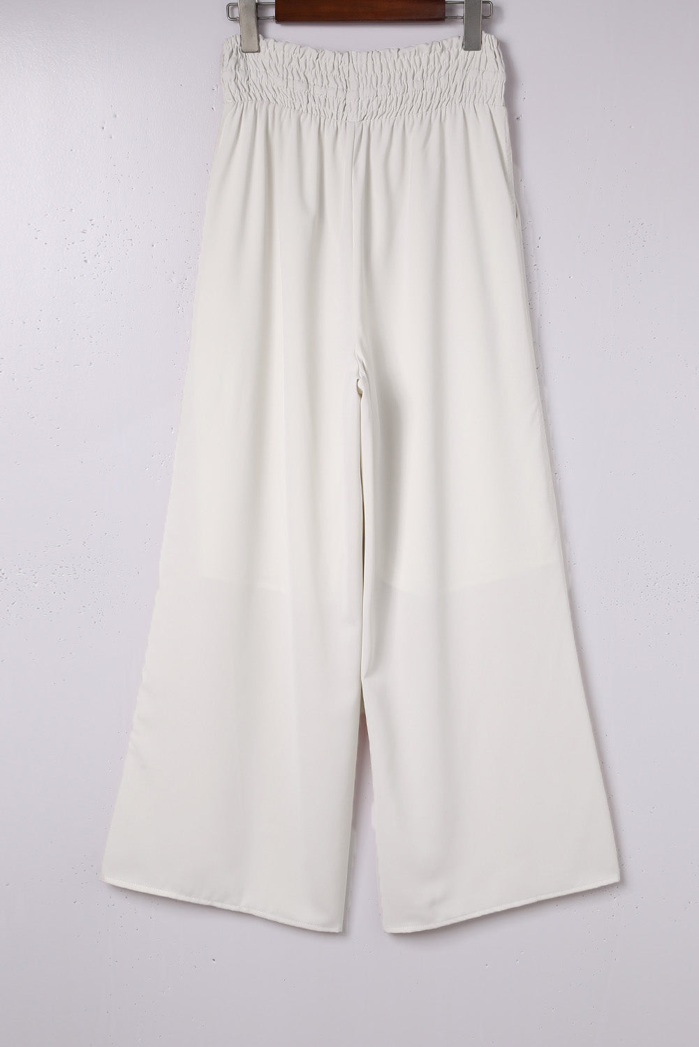 Pantalones anchos de cintura alta con fruncido en beige