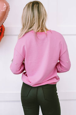 Côte dinner sweatshirt with candy pearl details