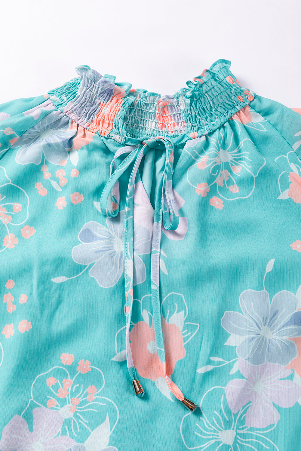 Blouse à manches bouffées à cou de cou floral bleu ciel