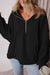 Black loose hoodie with kangaroo pockets and semi-ferms flash lined with fleece