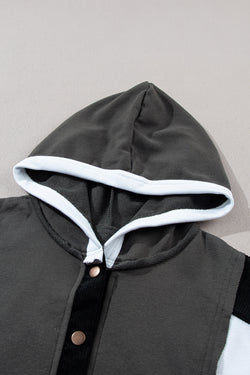 Black hoodie with button-down neckline and exposed stitching