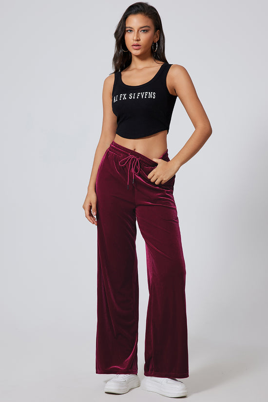 Large burgundy pants with size with tightening cord