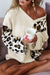 Asymmetrical leopard patchwork sweater with wide sleeves and beige V-neck