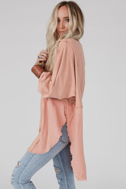 High and low oversized blouse with raw hem and crumpled sparse