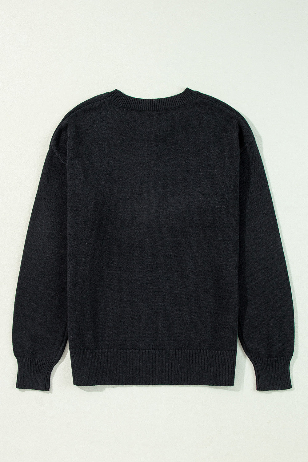 Black sweater with drooping shoulders and ribbed edges with Boo knitted pattern