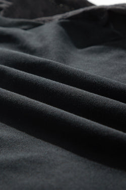 Plain black sweatshirt with patchwork sleeves and round neck