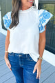 White blouse embroidered with fluffy sleeves and ruffle collar