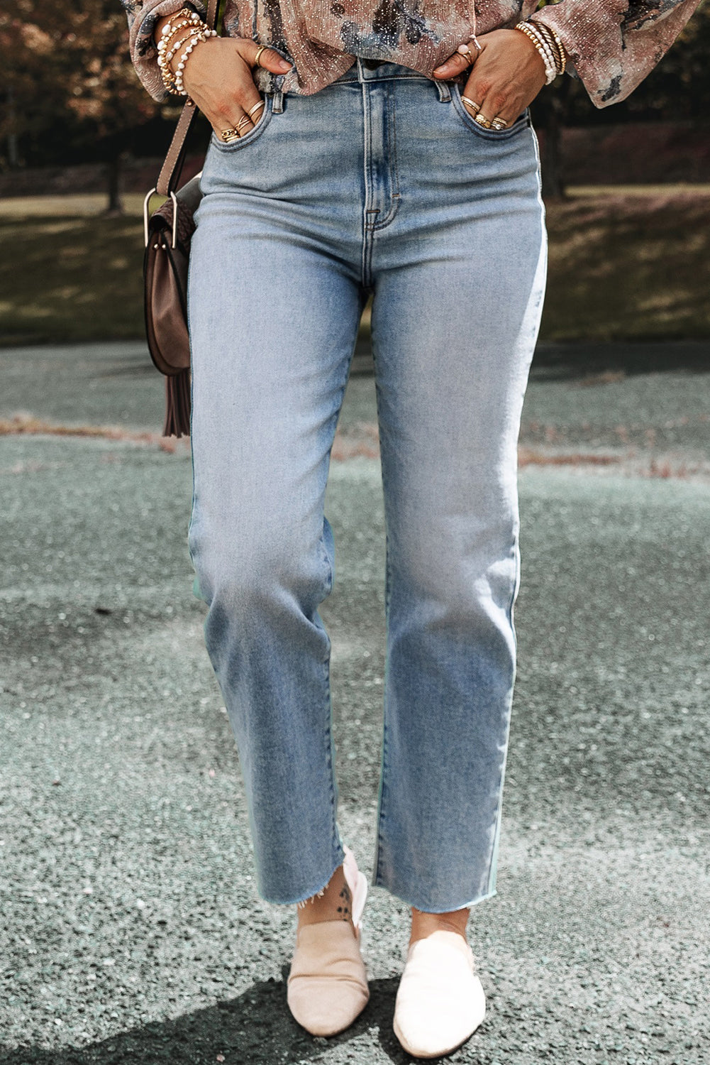 Light -blue right jeans faded with acid and raw edges