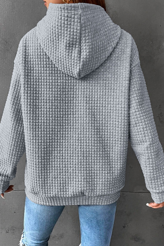 Grey quilted hoodie with kangaroo pocket and drawstring