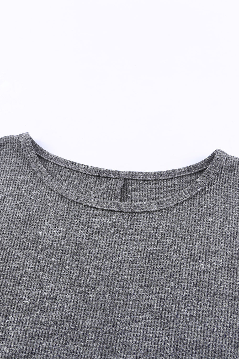 Haut pull gris en tricot gaufré avec fente latérale