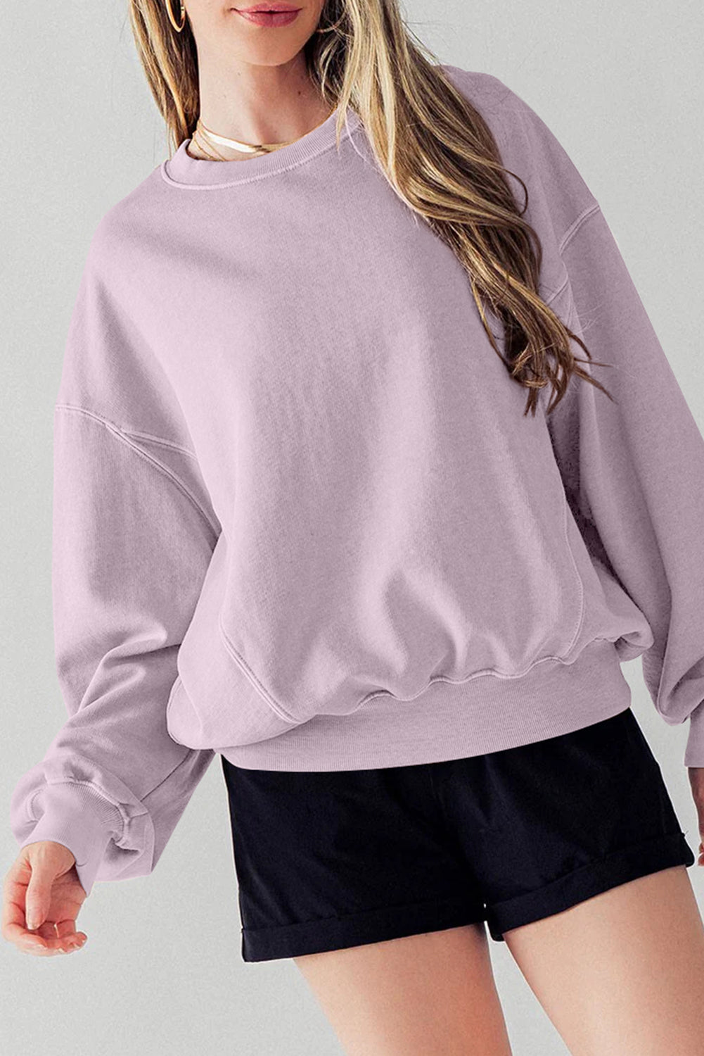 Sweat-shirt à épaules tombantes et manches chauve-souris avec coutures apparentes et pétales d'orchidées