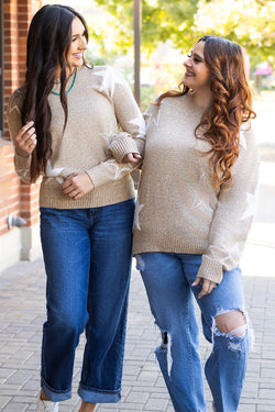 Khaki sweater with drooping shoulders and star pattern