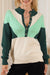 Pull vert à col en V et boutons en tricot à blocs de couleurs géométriques