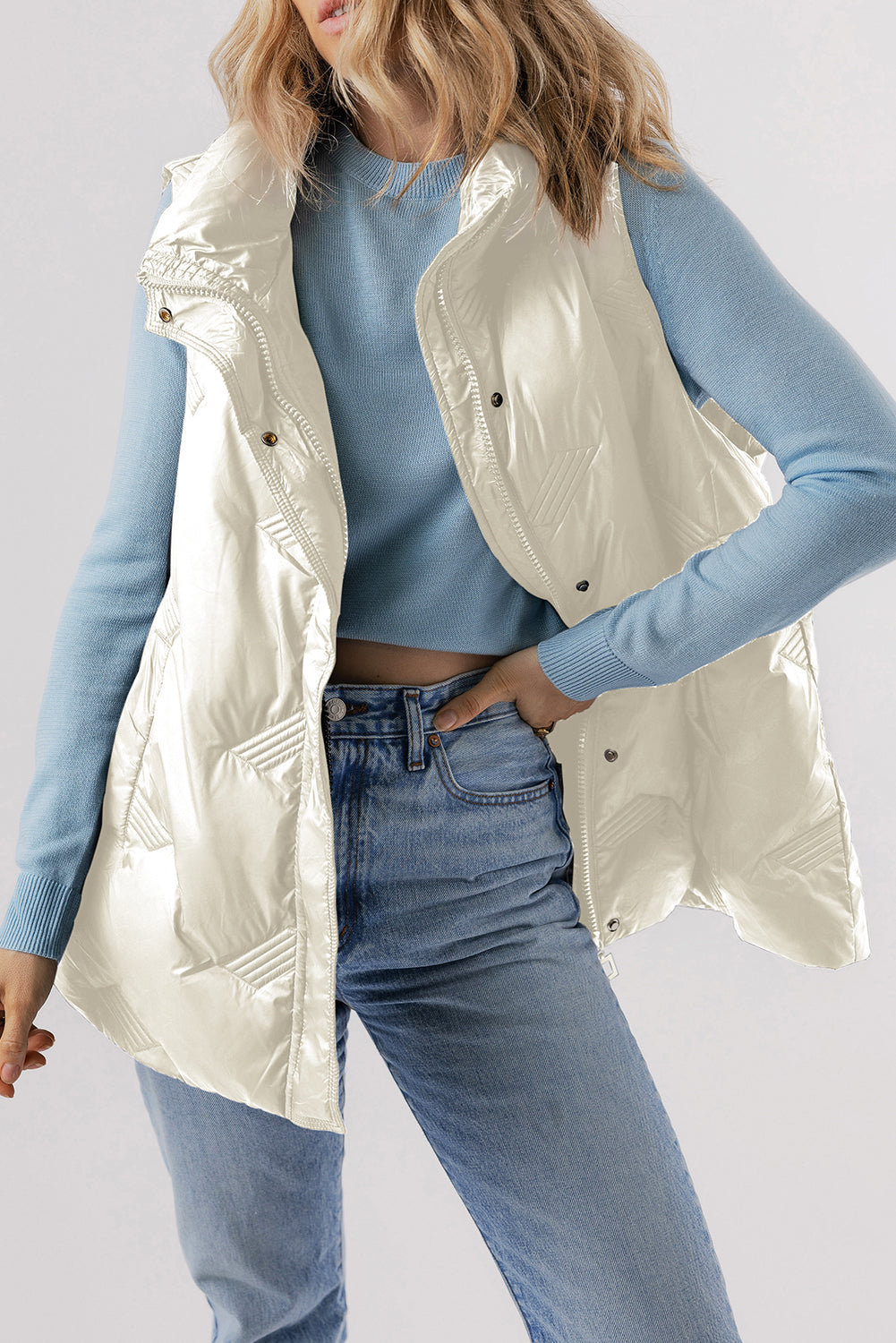 White quilted jacket with high collar and zipper