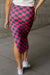 Long-waxing mid-length skirt with side slit and pink tiles print