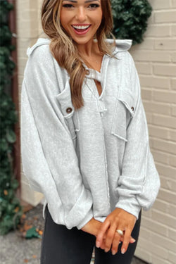 Grey sweatshirt with double chest pocket and visible stitching