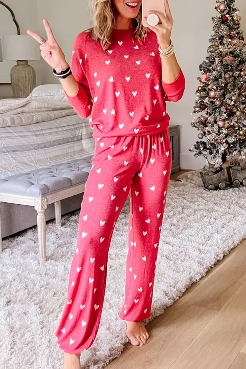 Pantalones rojos brillantes con estampado de corazón para el Día de San Valentín