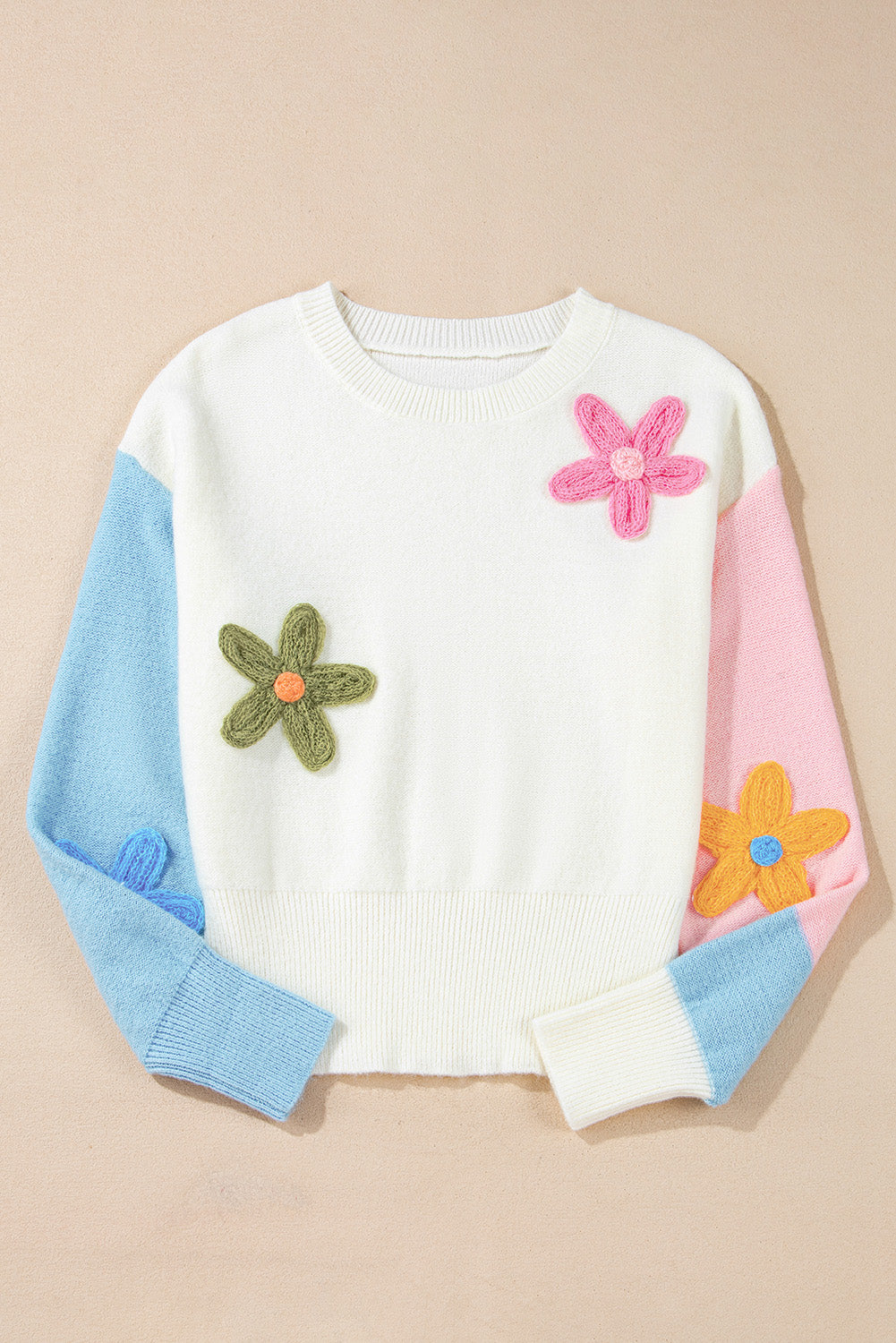 Multicolored sweater with dropped shoulders and multicolored floral embroidery