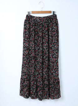 Trust high with black multicolored floral ruffles and long skirt