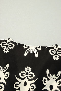 Black blouse with vintage geometric print *