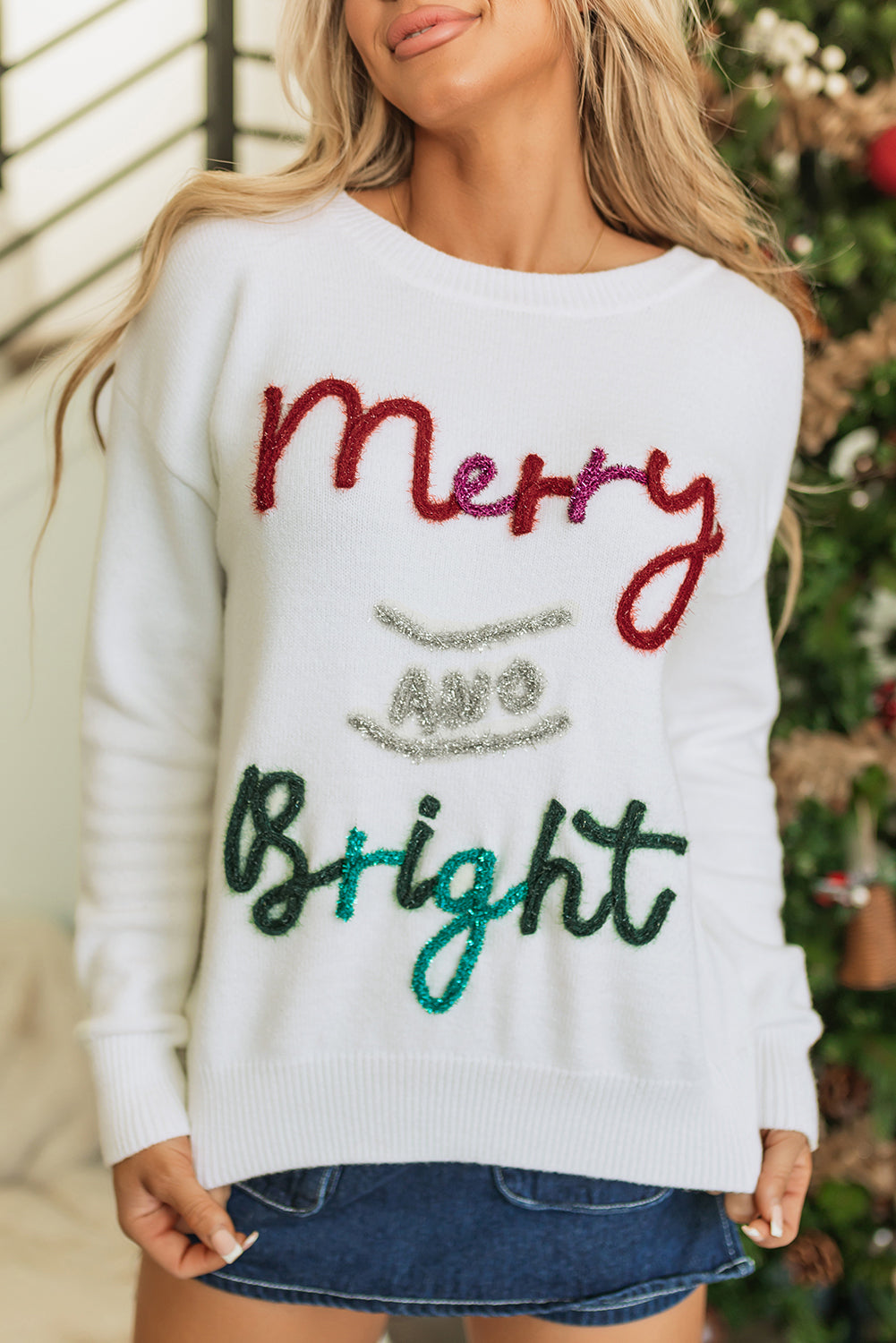 Bright and cheerful graphic Christmas sweater in white garlands