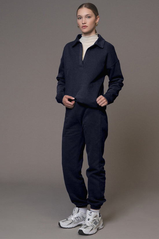 Swears and navy blue jogging sweater and pants in folded collar