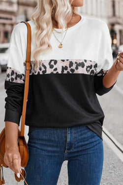 Black leopard top with long sleeves and a color block crew neck