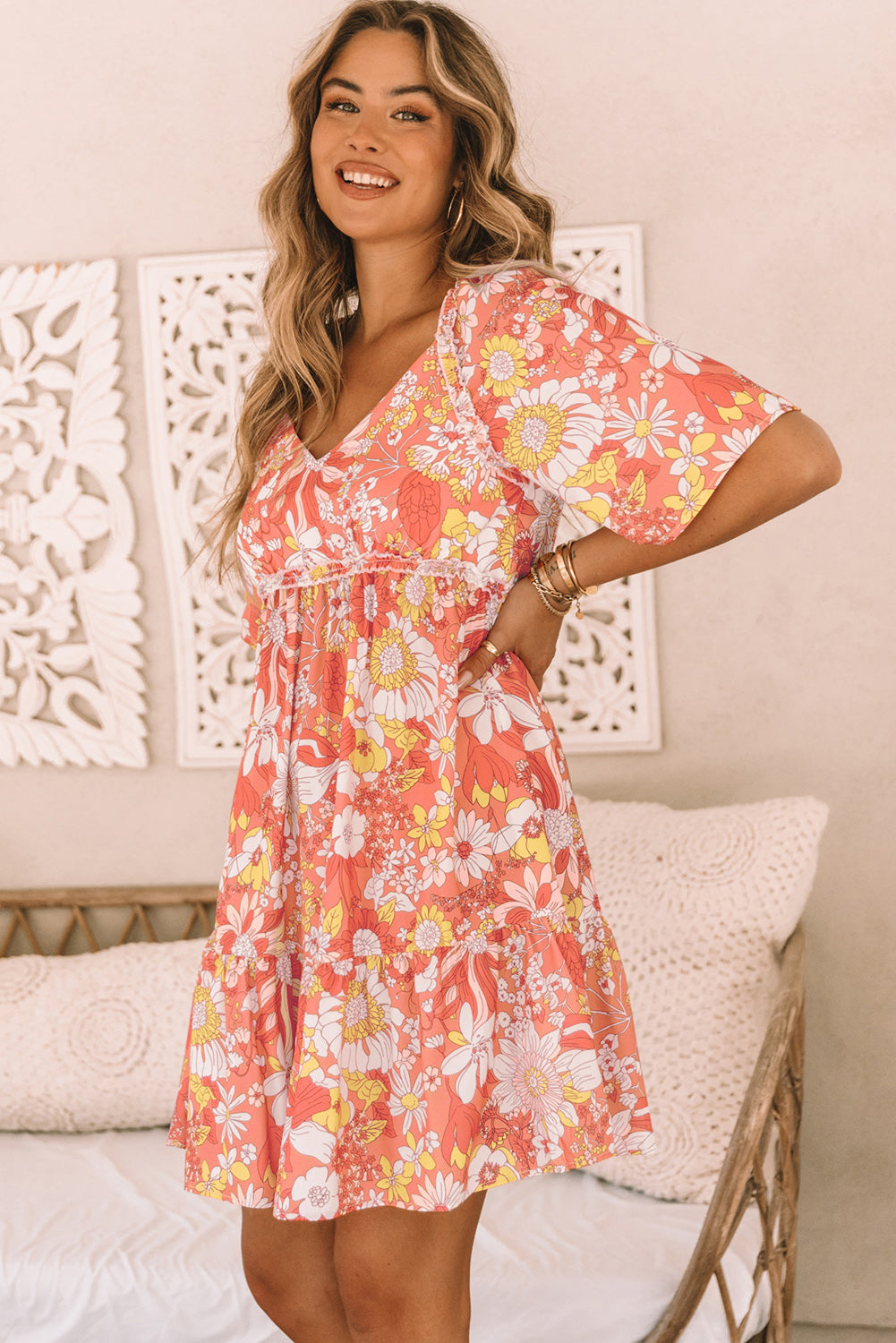 Orange floral dress with wide, flowing sleeves