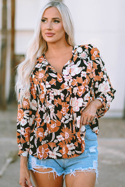 Brown babydoll blouse with floral print and 3/4 sleeves