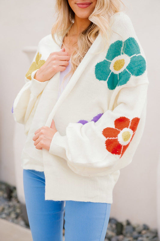 Cardigan ouvert à manches bulles en jacquard à fleurs blanches