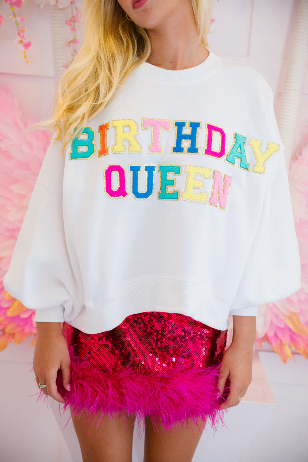 White sweatshirt with balloon sleeves and BIRTHDAY QUEEN print