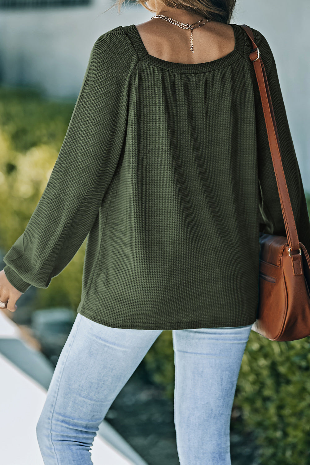 Haut en tricot gaufré vert à col rond et manches bouffantes