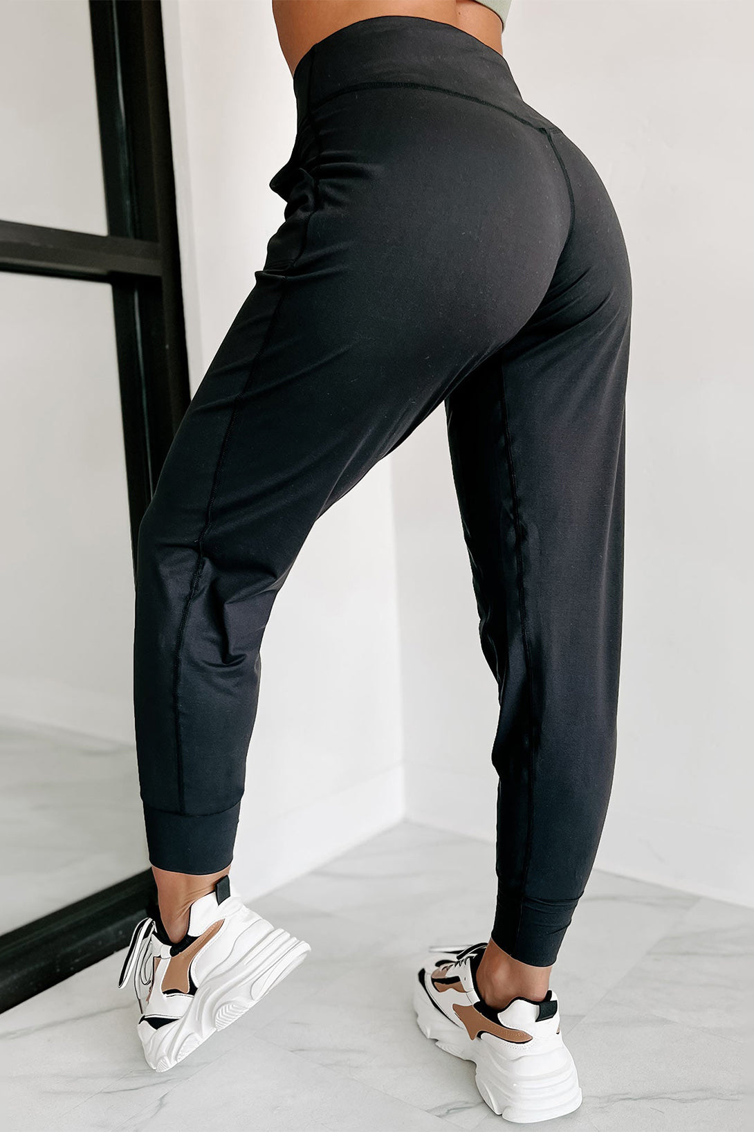 Pantalon de jogging taille haute noir avec poches et coutures apparentes