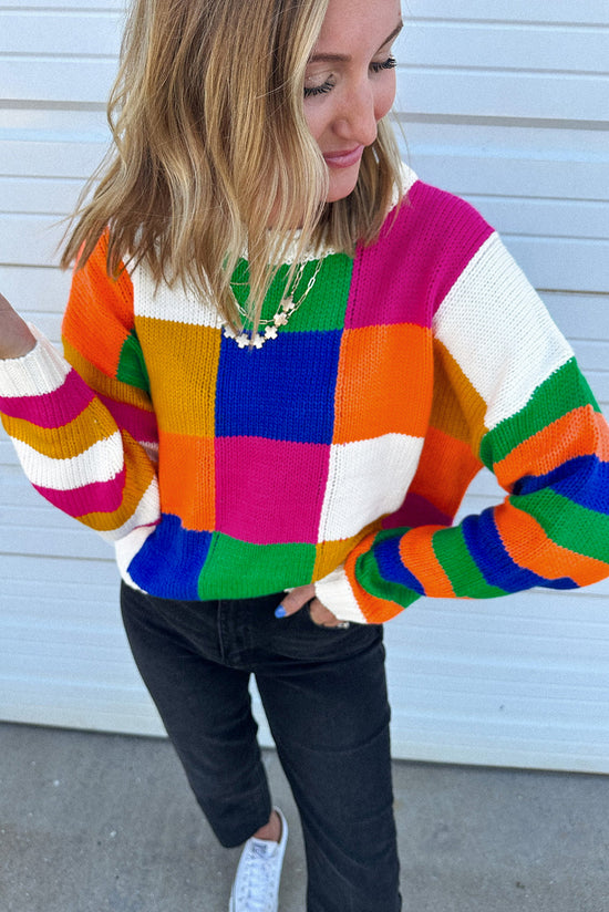 Ample orange tile sweater and color block, round neck