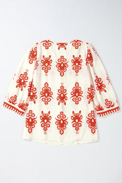 Orange blouse with geometric print*