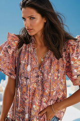 Orange blouse with floral print *