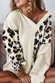 Asymmetrical leopard patchwork sweater with wide sleeves and beige V-neck