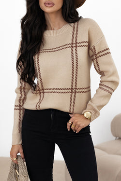 Khaki sweater with falling knitted shoulders with Scottish pattern