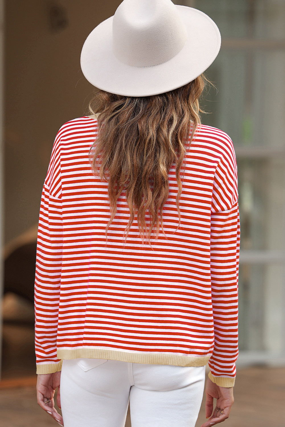 Striped drop shoulder sweater with bright red contrast trim