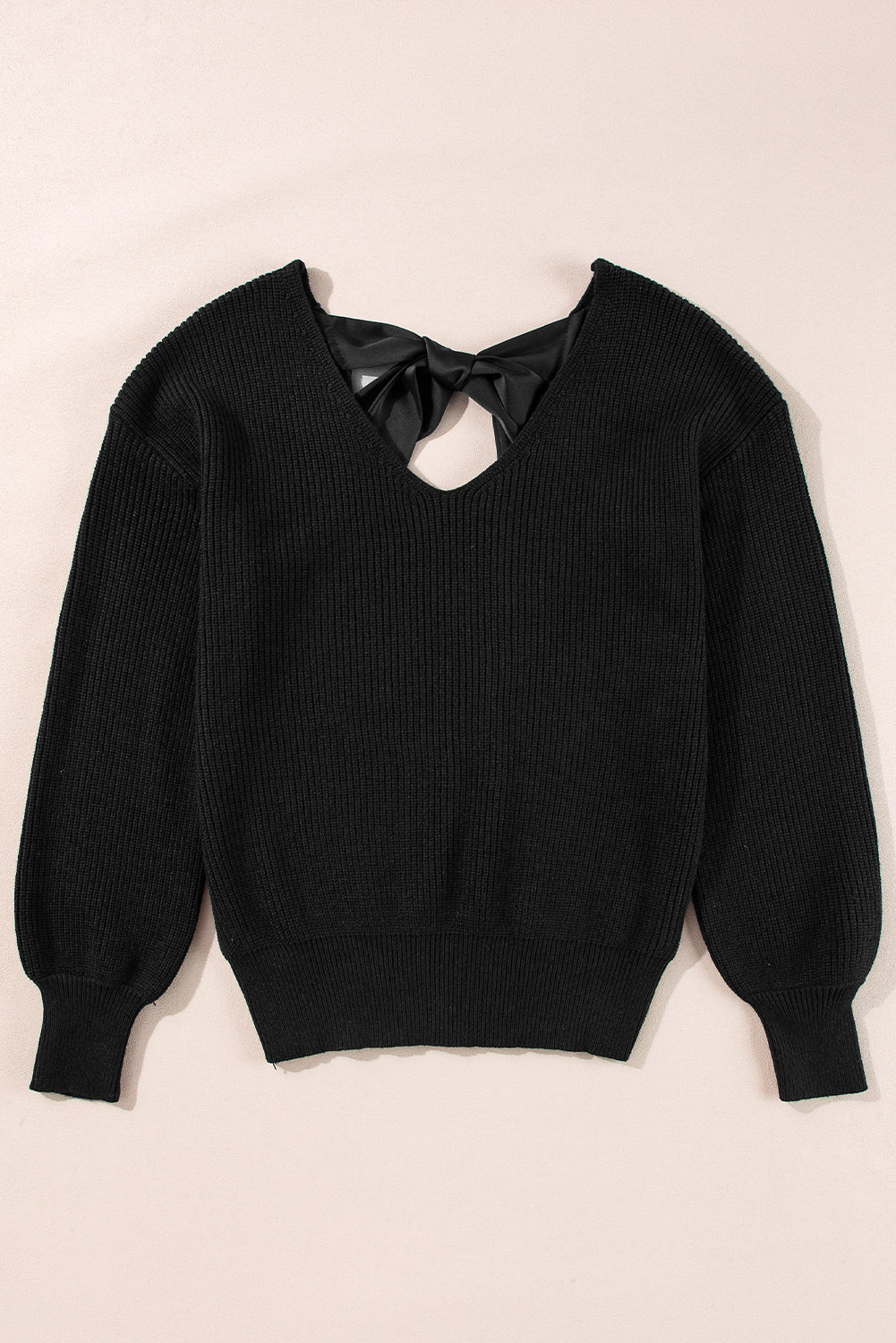 Black sweater with lantern sleeves, V-neck, knot at the back