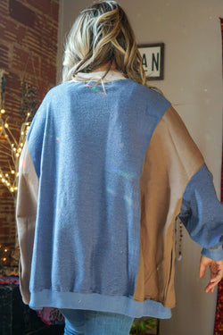 Sky blue baggy sweatshirt with color block sleeves and ribbed details