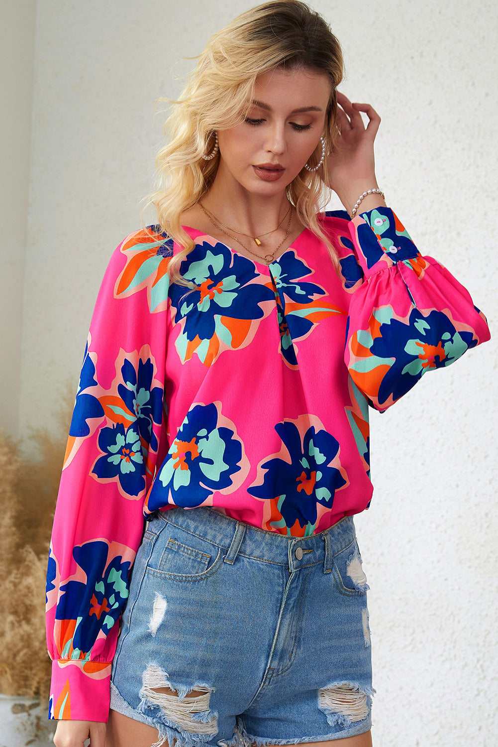 Blouse à manches bouffantes et imprimé fleurs roses