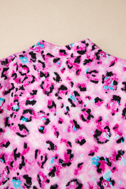 Bouton dress on the front with pink leopard print, 3/4 sleeves and ruffle hem