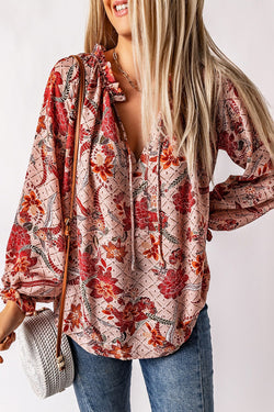 Pink printed blouse split in v -collar