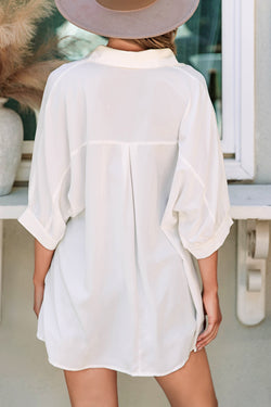 Oversize white shirt with 3/4 puffing sleeves